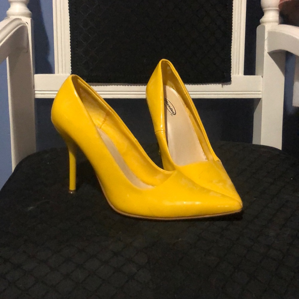 Yellow high heels